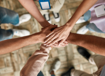 Group of hands on top of each other